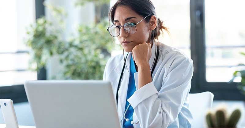 Healthcare professional using AR management technology